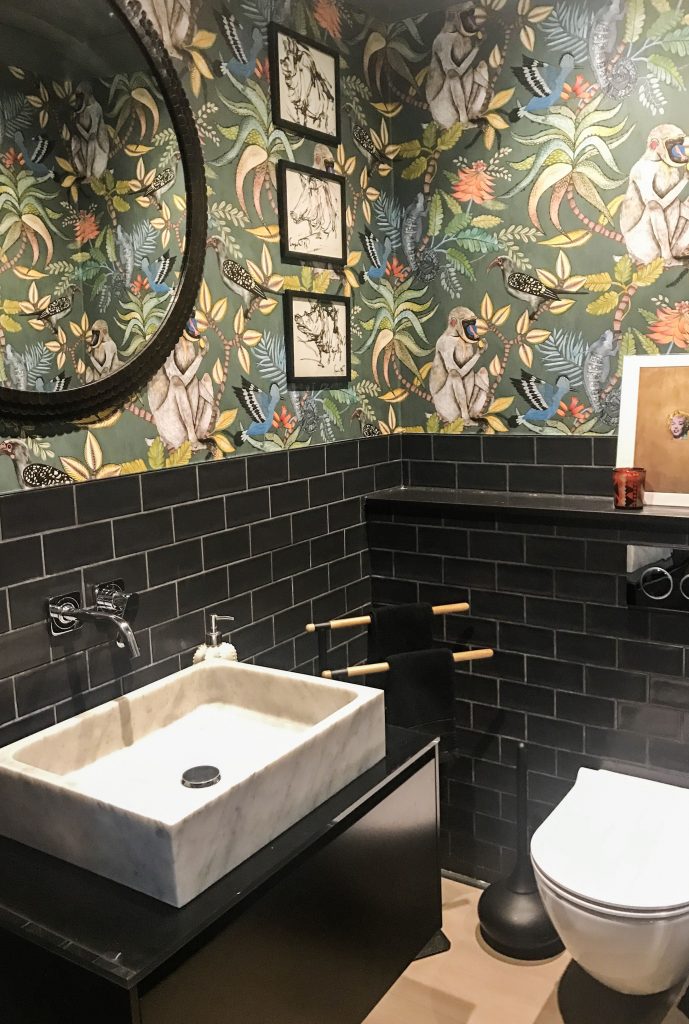 Savuti unique wacky tropical monkey wallpaper by cole-and-son.com installed in a bathroom