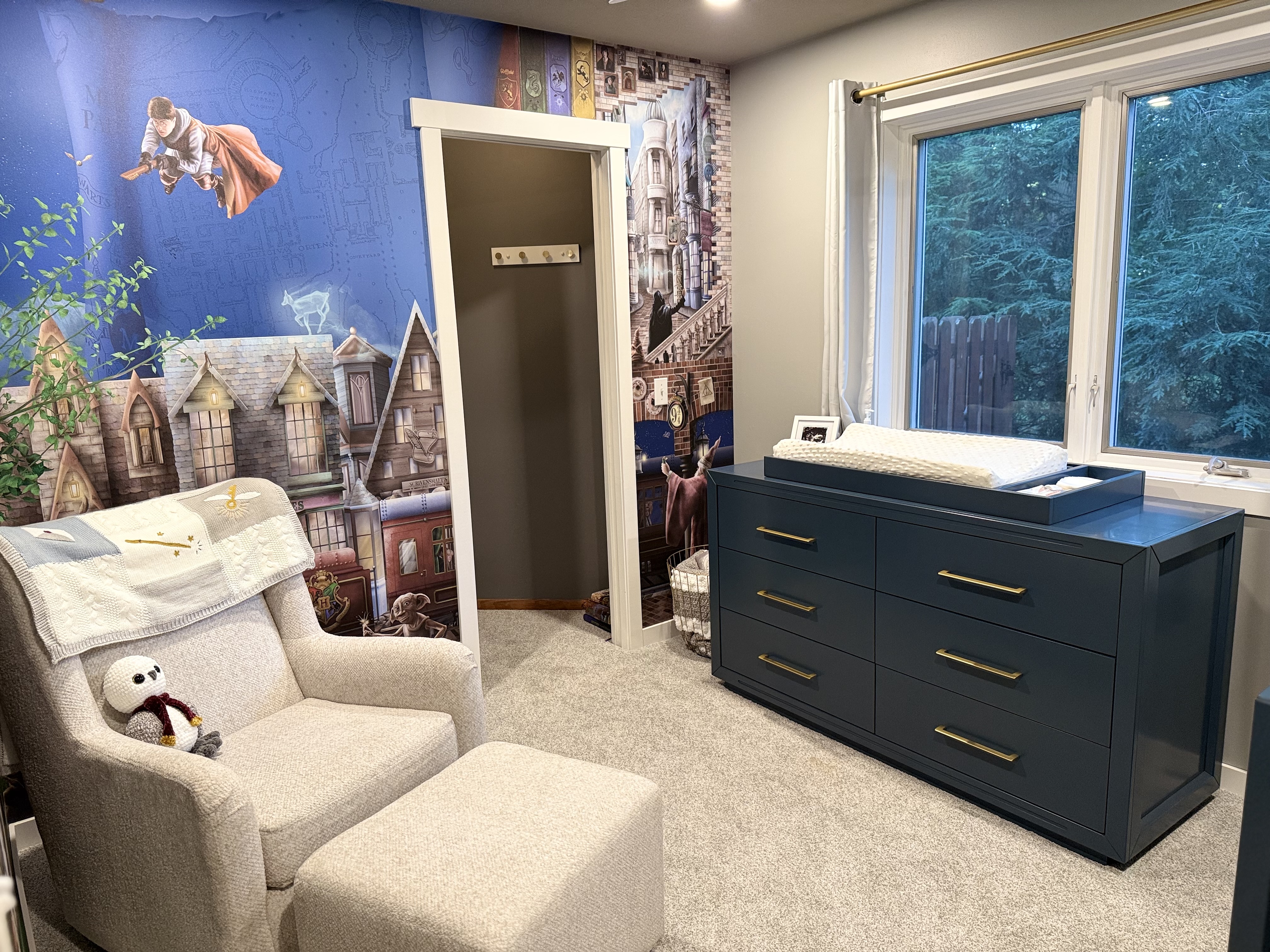 Harry Potter Wizard Wallpaper installed with commercial unpasted premium wallpaper in a nursery bedroom