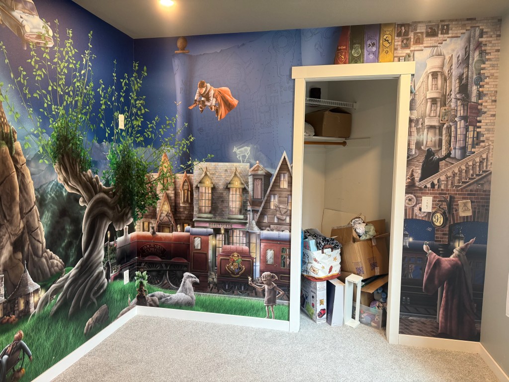 Harry Potter Wizard Wallpaper installed with commercial unpasted premium wallpaper in a nursery bedroom