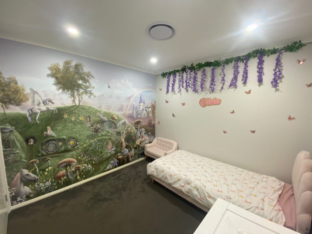 Custom girls wallpaper wall mural with unicorns and fairies. Commercial premium vinyl wall covering. Custom made to measure