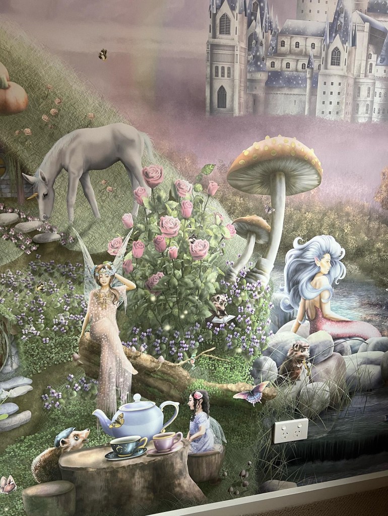 Custom girls wallpaper wall mural with unicorns and fairies. Commercial premium vinyl wall covering. Custom made to measure