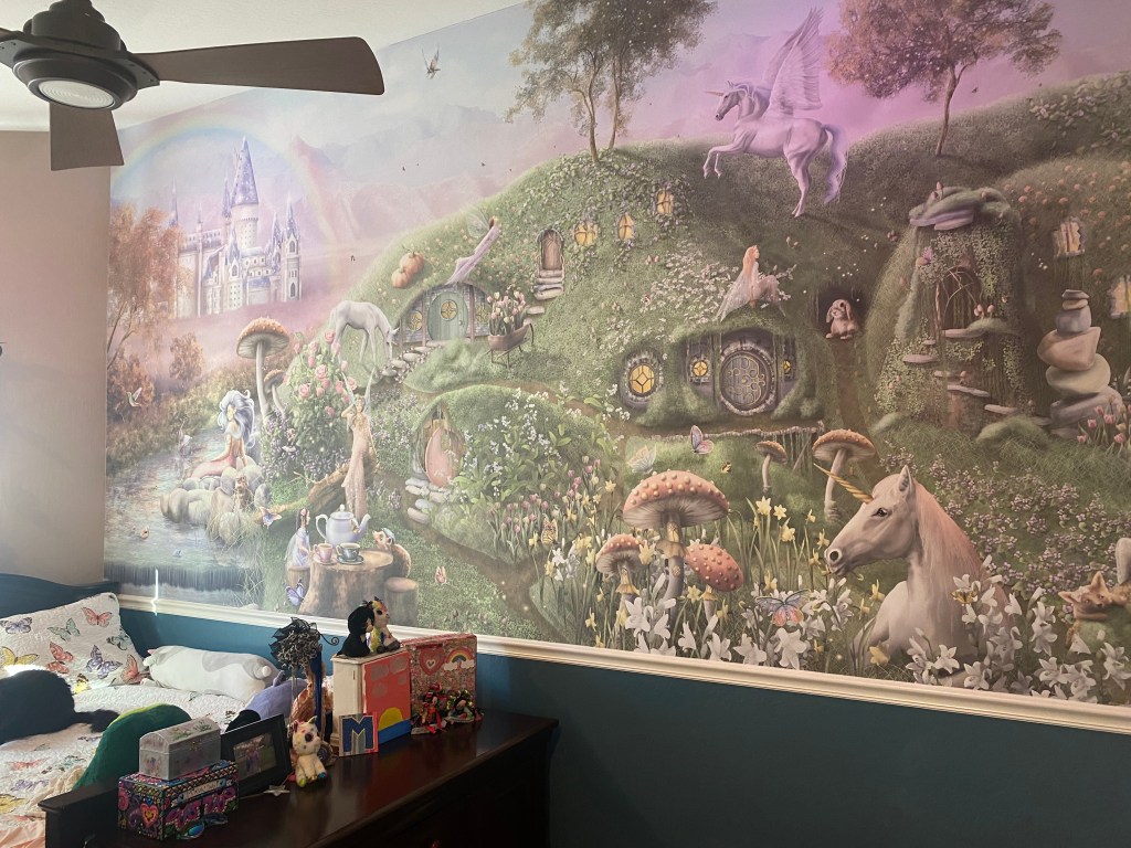 Custom girls wallpaper wall mural with unicorns and fairies. Commercial premium vinyl wall covering. Custom made to measure